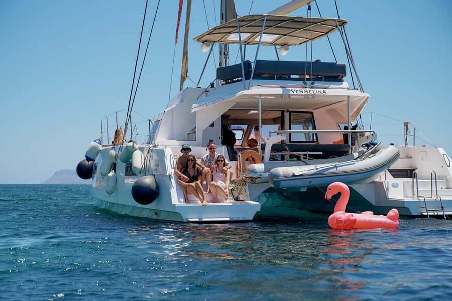 Chania: Morning Catamaran Cruise with Premium Lunch & Drinks - The swim-and-snorkel window: secluded bay time with gear included