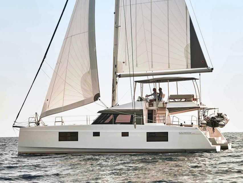 Chania: Private Day Catamaran Cruise with Swimming and Meal - Logistics that actually matter: no hotel pickup, meeting point, and weather